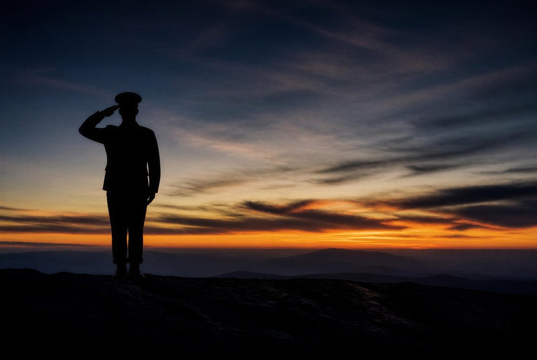 Silhouette of a military officer in dress uniform rendering a salute against a vivid sunset sky — header image for a guide to the military funeral order of service