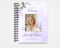 Soft Lavender and Peony memorial guest book template front cover — pale lavender watercolor background with dusty purple lavender sprigs, white peonies, sage eucalyptus, and a gold frame. 'In Loving Memory' with script name and photo placeholder. Standard size
